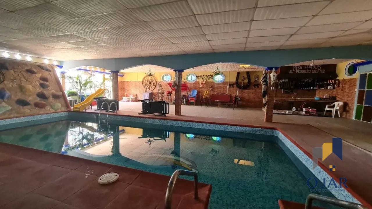 CASA VACACIONAL EN VENTA EN QUINTAS LA PONDEROSA, KM 77 HACIA PUERTO QUETZAL — Casa en Venta en Quintas La Ponderosa, Escuintla, Escuintla — foto 1 de 15