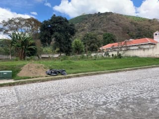 ESPECTACULAR TERRENO EN VENTA EN EXCLUSIVO CONDOMINIO A POCOS MINUTOS DEL CENTRO DE ANTIGUA — Terreno en Venta en Antigua, Sacatepéquez — miniatura 1 de 3